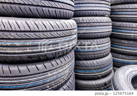 Summer vehicle tires stacked up Summer vehicle tires stacked up 125075164
