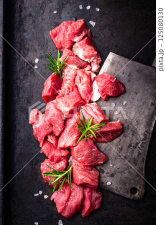 Raw beef meat and ingredients for cooking Raw beef meat and ingredients for cooking 125080130