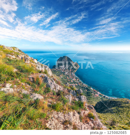 Spectacular view of Santa Flavia town with cape Zafferano and national park Orientata Pizzo Cane. 125082085