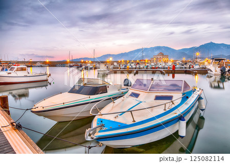 Remarkable  sunset view on boats in beautiful marina of Villasimius. 125082114