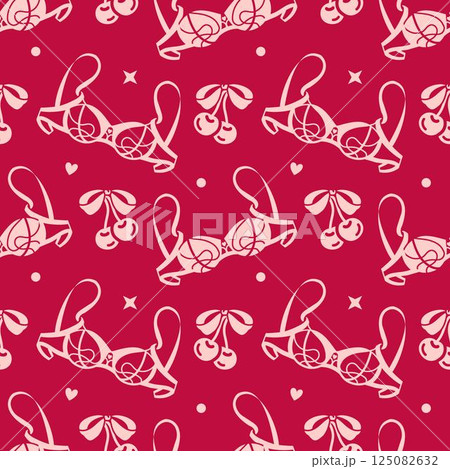 Playful seamless vector pattern with bras, ribbons, and cherries in bold pink. Flirty and feminine design for lingerie packaging, party invites, or girly branding projects 125082632