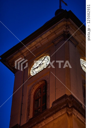 Old church tower in Europe at night Old church tower in Europe at night 125082931