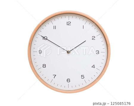 Minimal wall clock with light wood frame and white face displaying 01:50 or 13:50. Perfect for clean, modern concepts about time and scheduling. 125085176