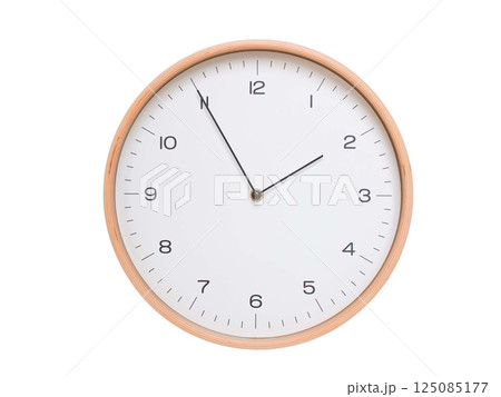 Minimal wall clock with light wood frame and white face displaying 01:55 or 13:55. Perfect for clean, modern concepts about time and scheduling. Minimal wall clock with light wood frame and white face displaying 01:55 or 13:55. Perfect for clean, modern concepts about time and scheduling. 125085177