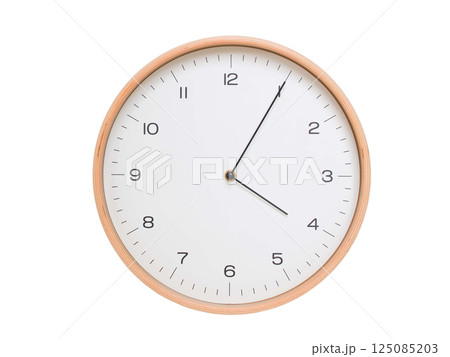 Minimal wall clock with light wood frame and white face displaying 04:05 or 16:05. Perfect for clean, modern concepts about time and scheduling. 125085203