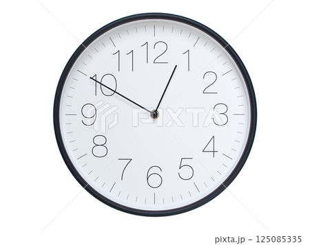 Simple wall clock with black frame and white face displaying 00:50 or 12:50. Ideal for time, schedule, and punctuality themes. Simple wall clock with black frame and white face displaying 00:50 or 12:50. Ideal for time, schedule, and punctuality themes. 125085335