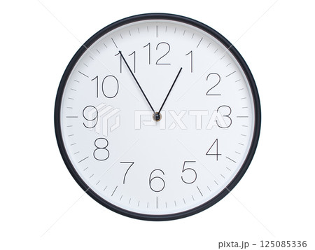 Simple wall clock with black frame and white face displaying 00:55 or 12:55. Ideal for time, schedule, and punctuality themes. 125085336