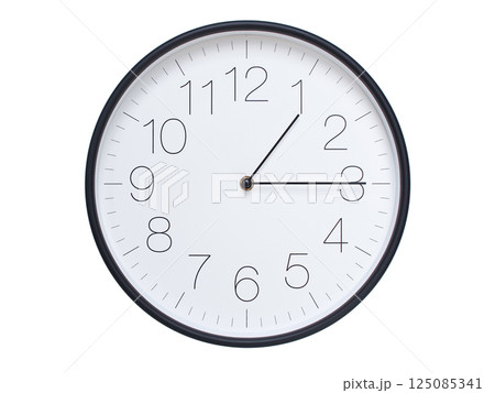 Simple wall clock with black frame and white face displaying 01:15 or 13:15. Ideal for time, schedule, and punctuality themes. 125085341