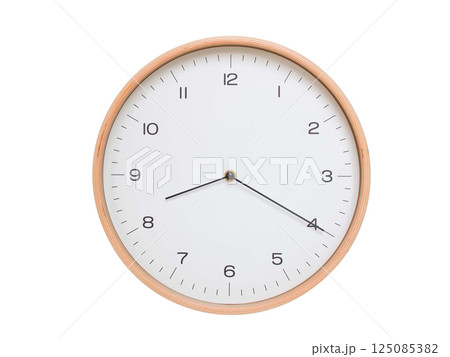 Minimal wall clock with light wood frame and white face displaying 08:20 or 20:20. Perfect for clean, modern concepts about time and scheduling. Minimal wall clock with light wood frame and white face displaying 08:20 or 20:20. Perfect for clean, modern concepts about time and scheduling. 125085382