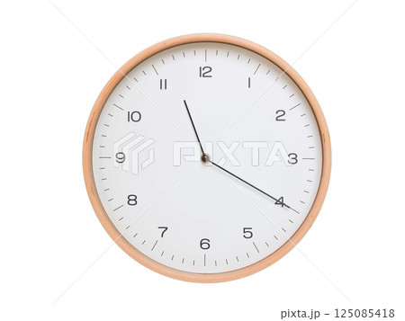 Minimal wall clock with light wood frame and white face displaying 11:20 or 23:20. Perfect for clean, modern concepts about time and scheduling. Minimal wall clock with light wood frame and white face displaying 11:20 or 23:20. Perfect for clean, modern concepts about time and scheduling. 125085418