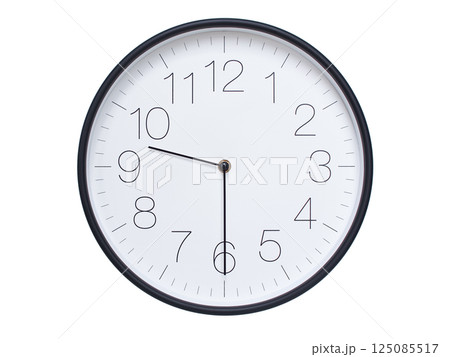 Simple wall clock with black frame and white face displaying 09:30 or 21:30. Ideal for time, schedule, and punctuality themes. 125085517