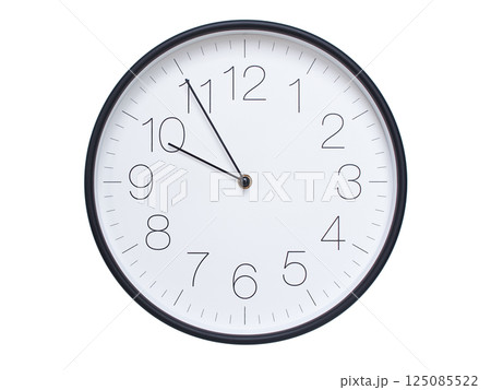 Simple wall clock with black frame and white face displaying 09:55 or 21:55. Ideal for time, schedule, and punctuality themes. 125085522