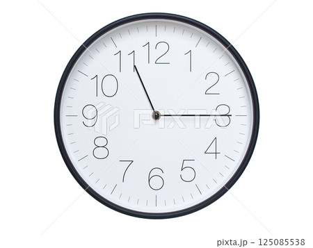 Simple wall clock with black frame and white face displaying 11:15 or 23:15. Ideal for time, schedule, and punctuality themes. Simple wall clock with black frame and white face displaying 11:15 or 23:15. Ideal for time, schedule, and punctuality themes. 125085538