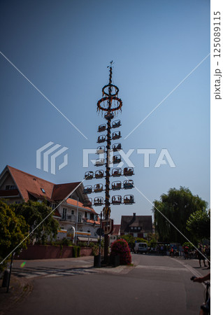 Vibrant Maypole Brings Joy to Bodensee Community During Festive Celebration Under Bright Sky 125089115