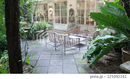 A vintage chair for decorating a backyard garden or cafe 125092281