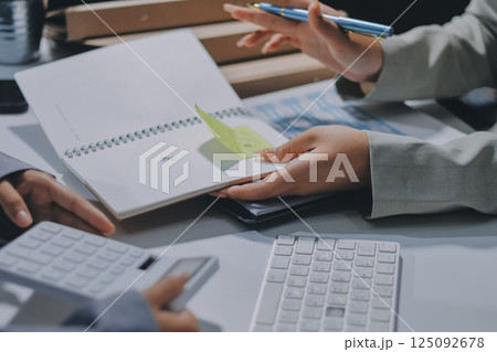 Portrait of Asian young female working on laptop at office 125092678