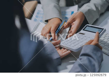 Portrait of Asian young female working on laptop at office 125092679