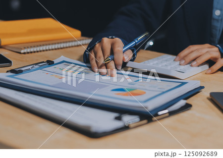 Portrait of Asian young female working on laptop at office 125092689