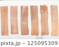 Set of watercolor brushstroke in the 2025 color of the year Mocha Mousse. Hand drawn textured template with elegant warm brown tone. Perfect for creating trendy graphic resource 125095309