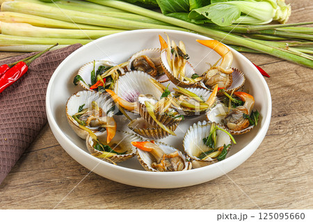 Asian mollusk shell steamed with spices 125095660