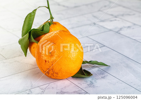 Sweet maniola citrus tropical fruit Sweet maniola citrus tropical fruit 125096004