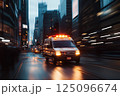 Emergency medical vehicle hurry on city street. Ambulance 125096674