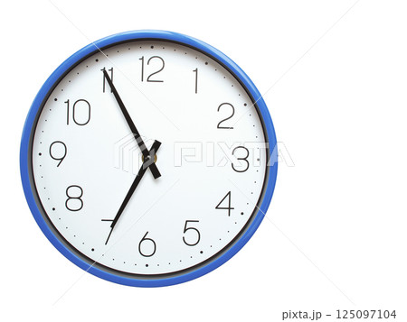 Wall clock with blue frame showing 6.55 06.55 or 18.55 O clock  on white background, suitable for time related articles, education, or punctuality concepts 125097104