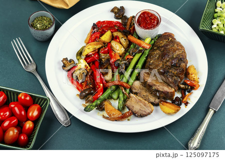 Freshly baked duck breast. 125097175