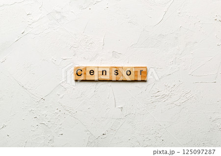 Censor word written on wood block. Censor text on cement table for your desing, concept Censor word written on wood block. Censor text on cement table for your desing, concept 125097287