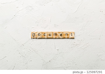 Document word written on wood block. Document text on cement table for your desing, concept 125097291