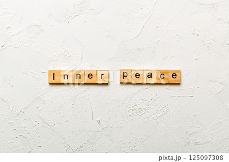 inner peace word written on wood block. inner peace text on table, concept 125097308
