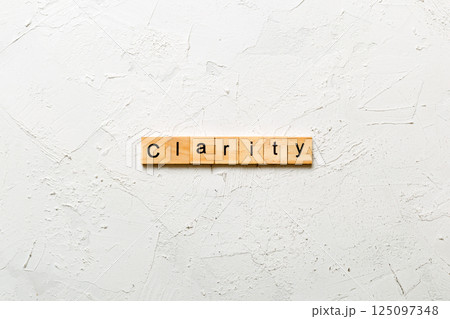 clarity word written on wood block. clarity text on table, concept 125097348