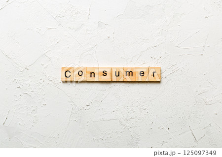 consumer word written on wood block. consumer text on table, concept consumer word written on wood block. consumer text on table, concept 125097349
