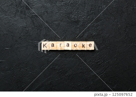 karaoke word written on wood block. karaoke text on table, concept karaoke word written on wood block. karaoke text on table, concept 125097652