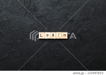 leadership team word written on wood block. leadership team text on cement table for your desing, concept 125097653