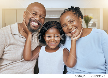 Love, care and portrait of a child with grandparents in the living room of their family home. Support, smile and girl kid with affection for happy senior man and woman in their house with flare Love, care and portrait of a child with grandparents in the living room of their family home. Support, smile and girl kid with affection for happy senior man and woman in their house with flare 125099473