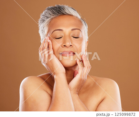 Beauty, self care and senior woman with skincare treatment for healthy glow, anti aging and body wellness. Dermatology, cosmetics and relax aesthetic face of elderly model with natural facial makeup 125099872