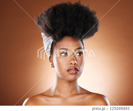 Beauty, hair and afro with black woman and scarf for fashion, luxury and skincare wellness. Makeup, cosmetic and curly hair with girl model for self love, confidence and African in studio background 125099893