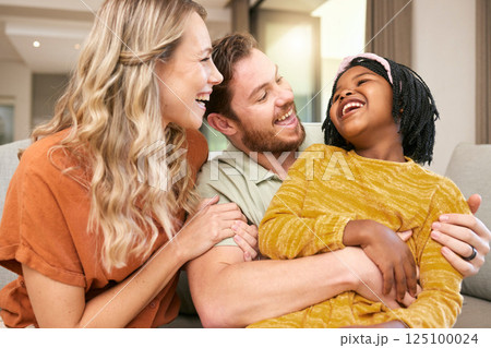 Family, love and hug, laughing and happiness with care and funny, bonding and couple with black child together at family home. Happy family, adoption or foster care and interracial with relationship. Family, love and hug, laughing and happiness with care and funny, bonding and couple with black child together at family home. Happy family, adoption or foster care and interracial with relationship. 125100024