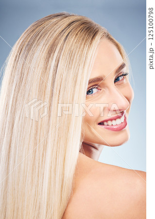 Hair, face and beauty with woman in makeup portrait, hair care and skincare with cosmetics against studio background. Model smile, hairstyle and wellness, clean and shine with natural cosmetic. Hair, face and beauty with woman in makeup portrait, hair care and skincare with cosmetics against studio background. Model smile, hairstyle and wellness, clean and shine with natural cosmetic. 125100798