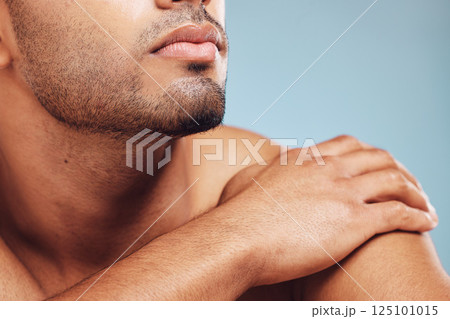 Man, jaw and skincare, face grooming and beard for beauty, aesthetic wellness and healthy skin on studio blue background. Closeup of handsome guy model, facial hair and dermatology body cosmetics Man, jaw and skincare, face grooming and beard for beauty, aesthetic wellness and healthy skin on studio blue background. Closeup of handsome guy model, facial hair and dermatology body cosmetics 125101015