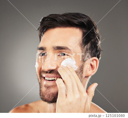 Skincare cream, face product and man with with dermatology ointment for acne prevention, beauty or self care. Facial cosmetics, healthcare treatment or model moisturizing with lotion for glowing skin 125101080
