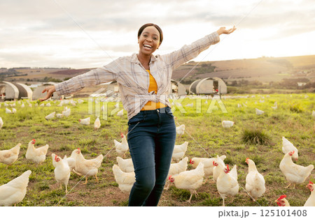 Winner, farm and chickens with a black woman agriculture worker in celebration while farming in the poultry industry. Farmer, motivation and countryside with a female agricultural expert outdoor 125101408