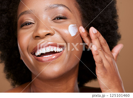 Skincare, face cream and woman in studio for wellness, beauty and cleaning against brown background. Portrait, black woman and sunscreen product on face for luxury, facial and dermatology with mockup 125101460