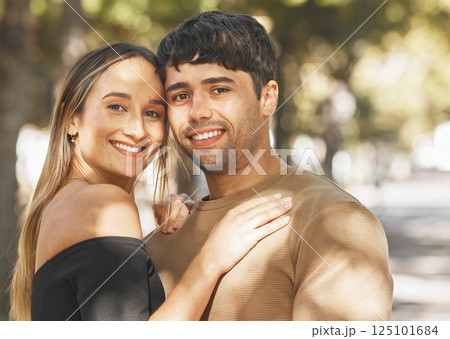 Happy, smile and portrait of a couple in a garden on a romantic summer date together in nature. Happiness, love and young man and woman in Mexico standing in a park while on a walk for fresh air. 125101684
