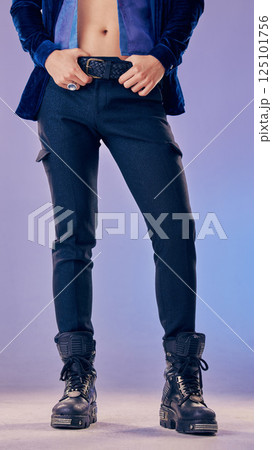 Fashion, shoes and man in studio for vintage, retro and punk style against a gradient background mockup. Feet, model and rock n roll by model pose in trendy boots, urban style and gen Z aesthetic 125101756