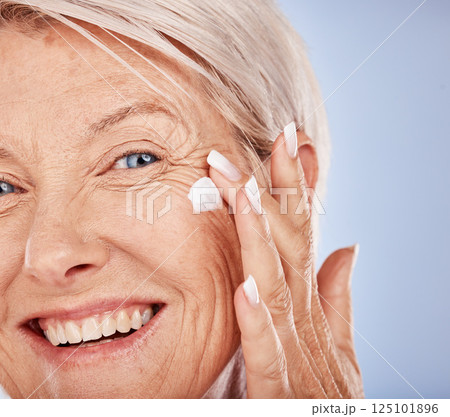 Senior woman, portrait and face cream for anti aging, lifting and wrinkle care, wellness and health. Beauty, moisturiser and cosmetology or dermatology facial lotion for glowing and smooth skin 125101896