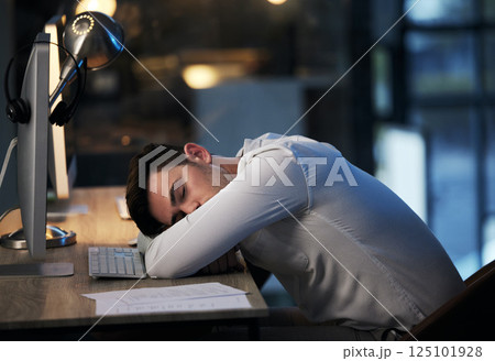 Man, burnout and sleep in call center office, overworked from working at crm compliance consulting company. Businessman, sleeping and mental health stress from corporate document planning online 125101928