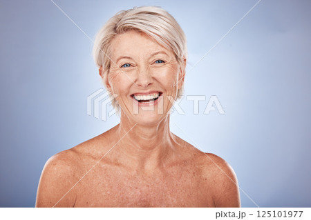Face, beauty and antiaging with a senior woman in studio on a gray background for skincare or wellness. Portrait, cosmetics and luxury with a mature female posing to promote a natural skin product 125101977