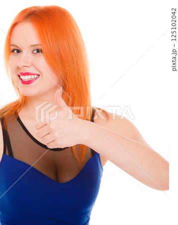 Happy woman giving thumbs up sign isolated 125102042
